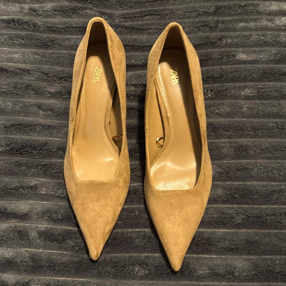 Women's adorable suede working pumps featuring leopard heels.